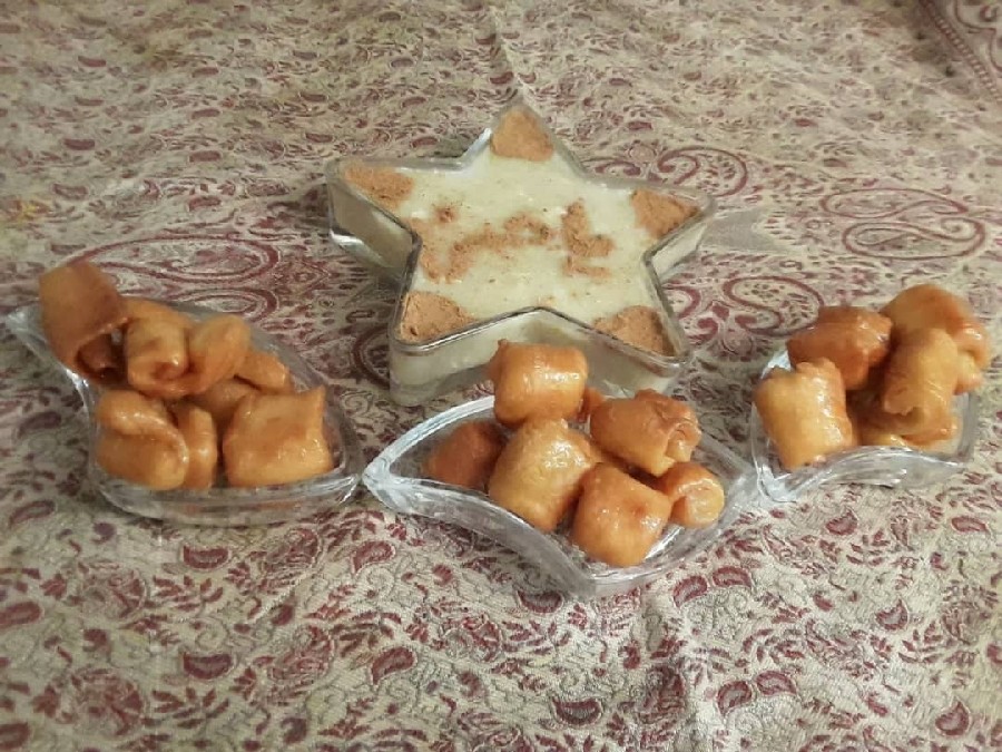 عکس حلیم با گوشت بوقلمون وشیرینی رولی فوری