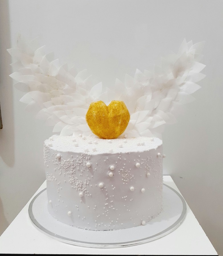 عکس کیک خامه ای طرح بال فرشته 
