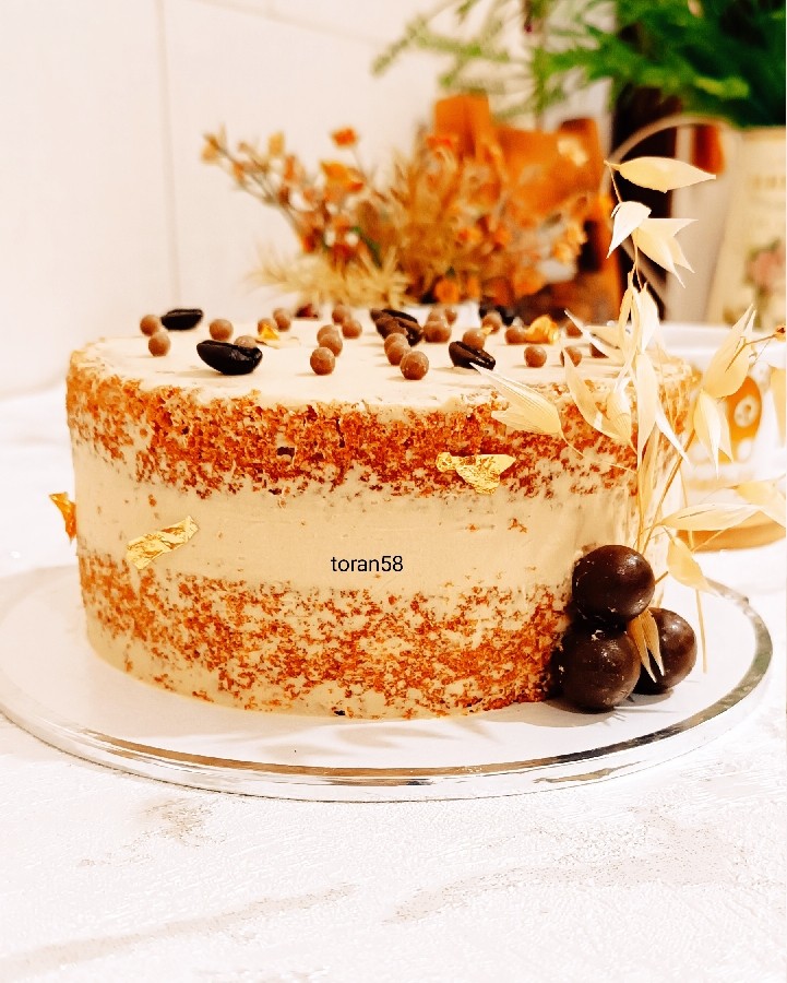 عکس کیک اسپرسو‌ با فیلینگ پاتیسر شکلاتی