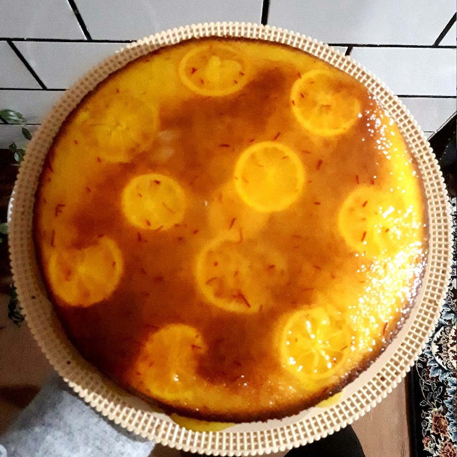 عکس کیک پرتقالی با روکش سس پرتقالی و زعفرون