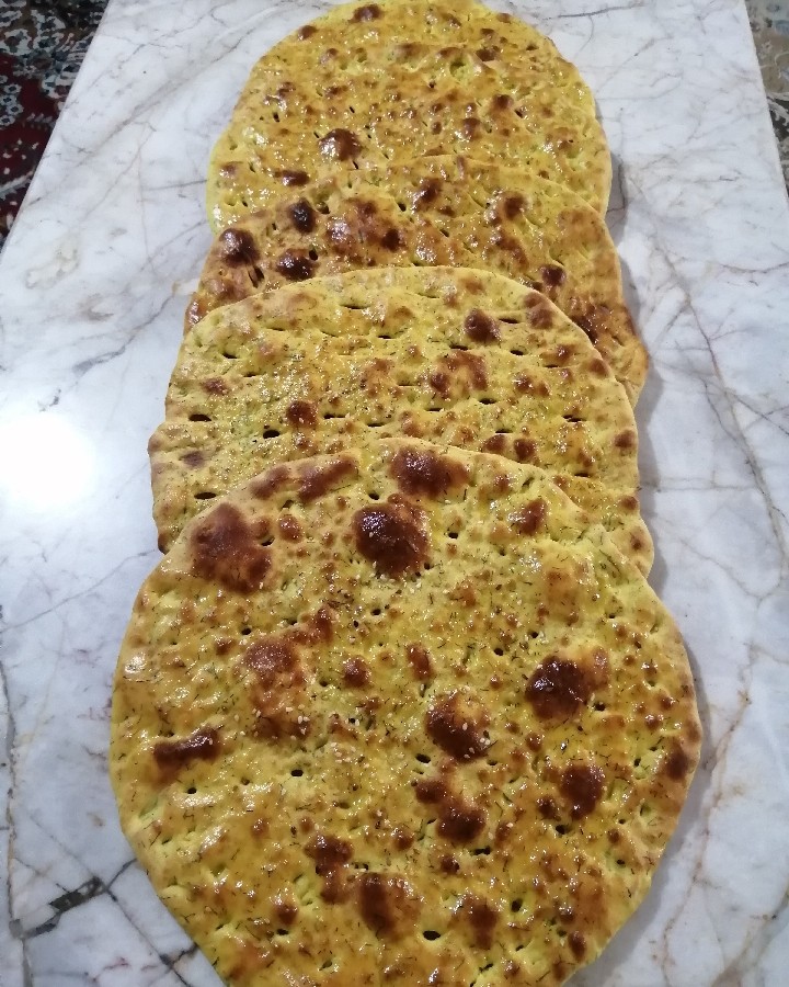 عکس پخت نان تو تنور گازی