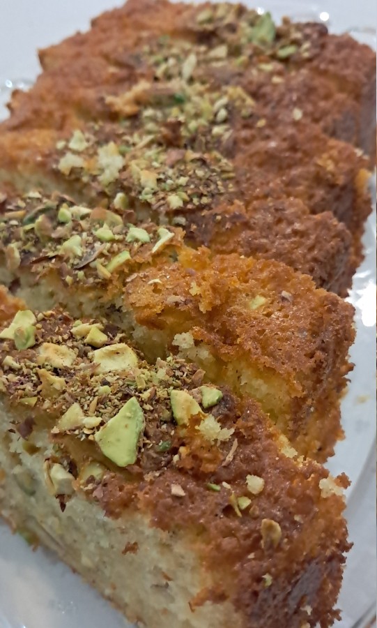 عکس کیک پرتقالی بامغزپسته دستپخت مشترک منوهمسرجان❤️