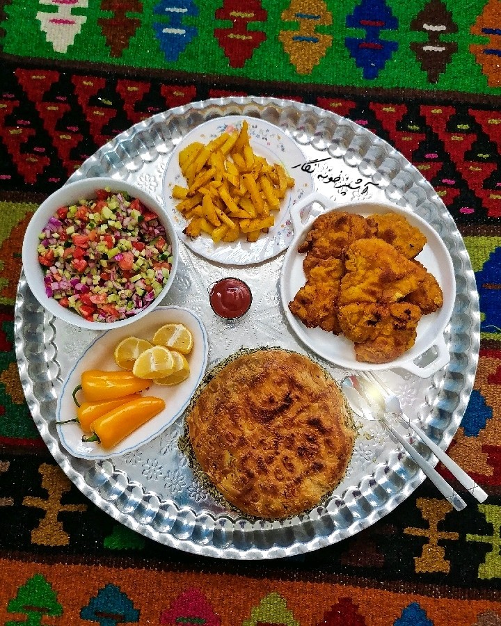 عکس شنیسل مرغ با باقالی پلو
