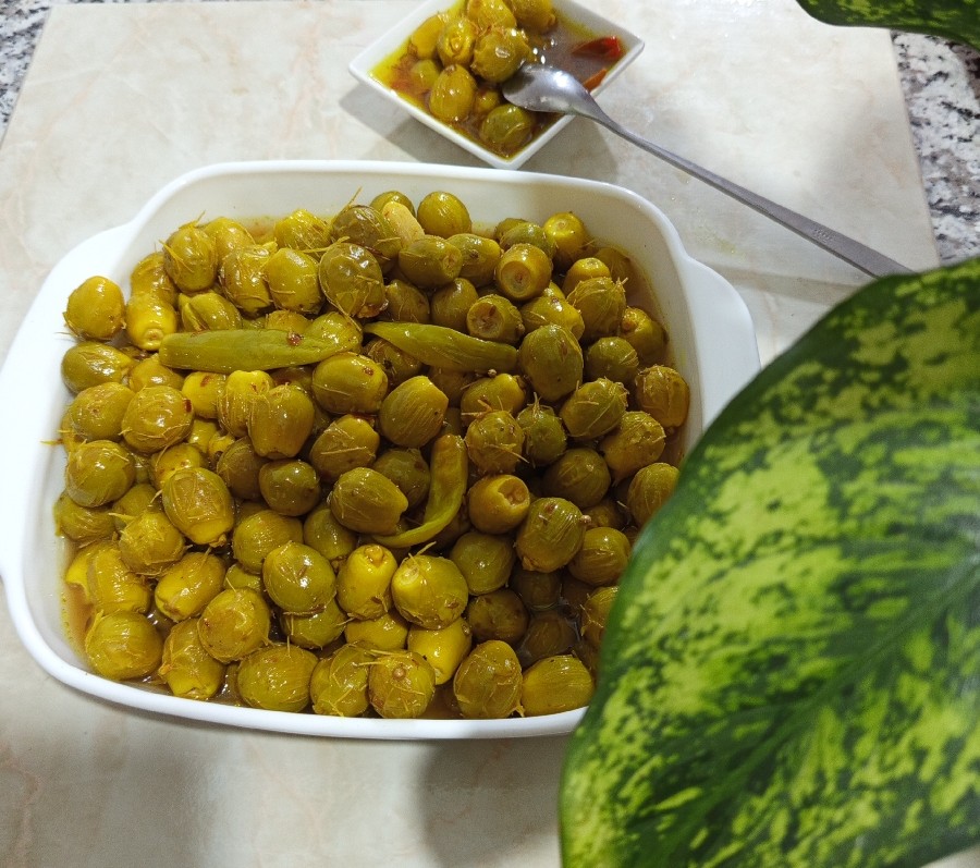 عکس ترشی پپوک(خرمایی نارس)