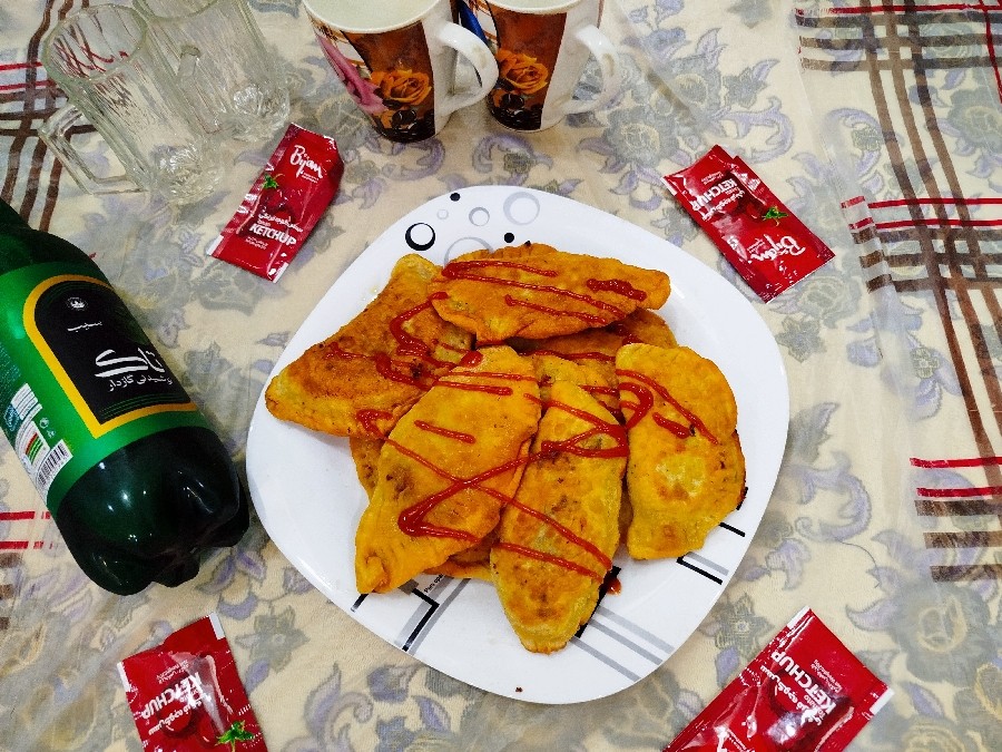 عکس پیراشکی گوشت و قارچ