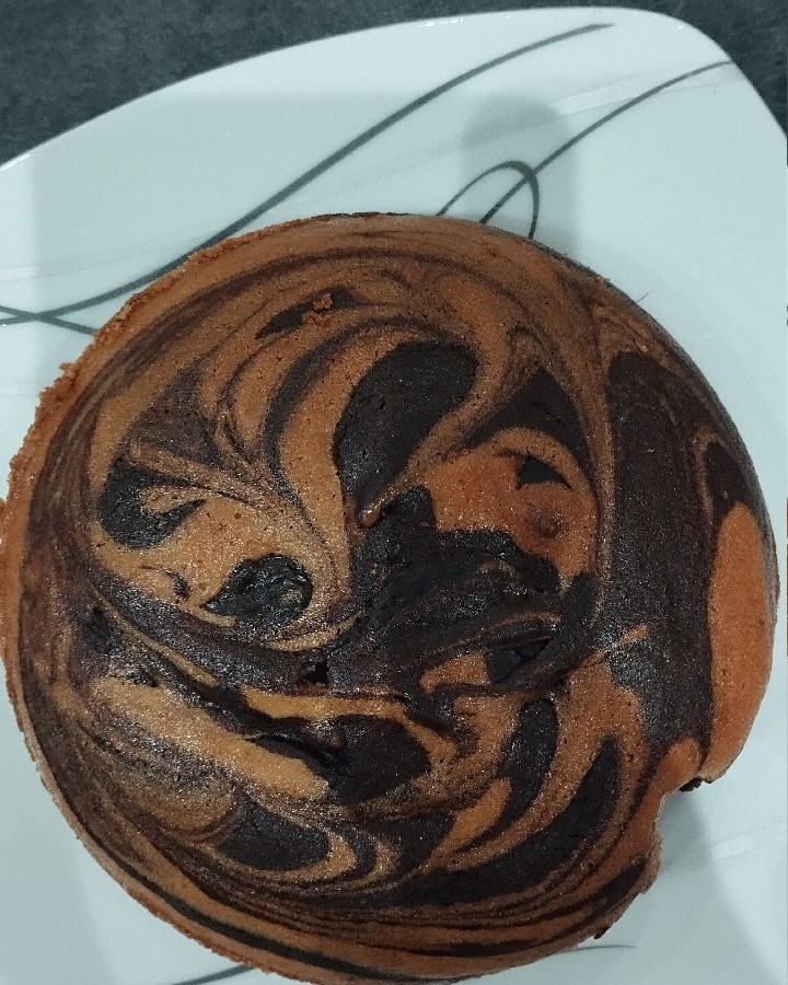 عکس کیک دو رنگ بدون تخم مرغ سارا خانم
خیلی کیک خوش بافت و راحتی بود ، ممنونم بخاطر دستور بی نقص تون