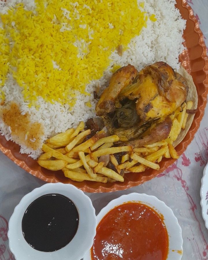 عکس اکبر جوجه 
با سس رب گوجه و رب انار