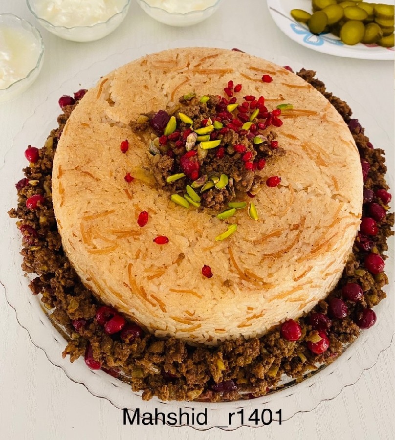 عکس رشته پلو با آلبالو و چرخ‌کرده 