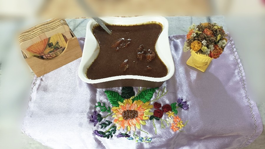 عکس فسنجون با تخم خربزه