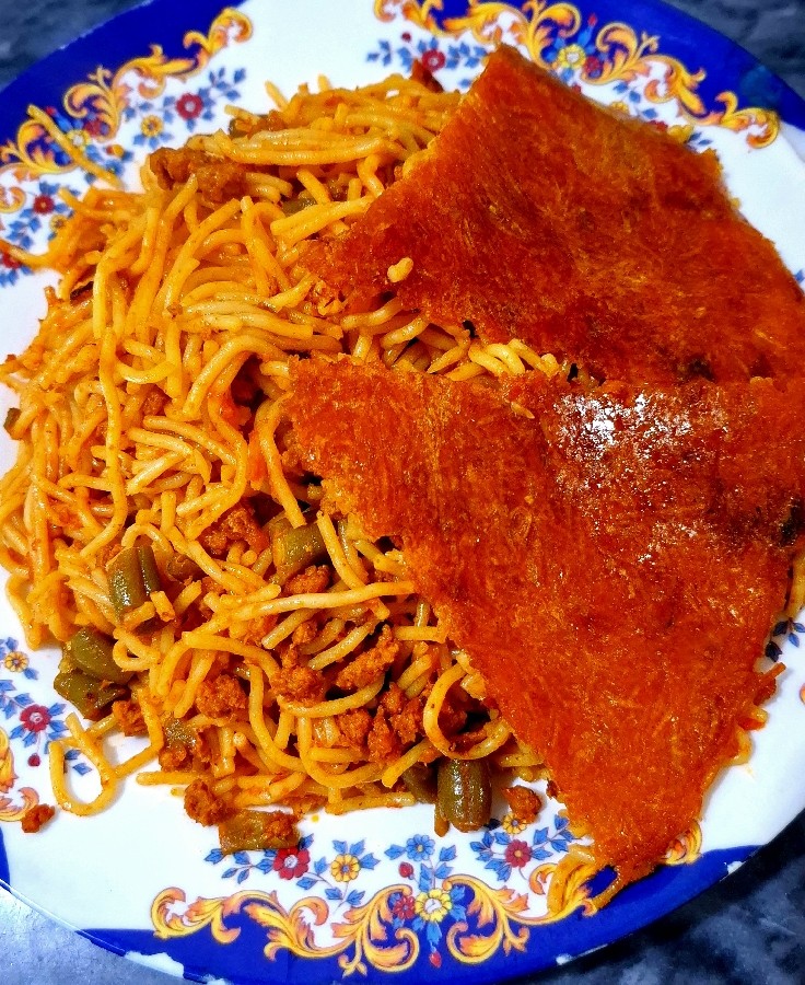 عکس ماکارونی با تهدیگ سیب زمینی رنده شده