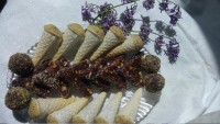 رول خرمابیسکویتی وحلوا