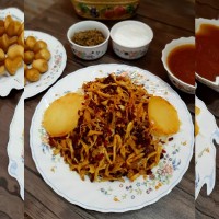 زرشک پلو با مرغ ریش ریش.