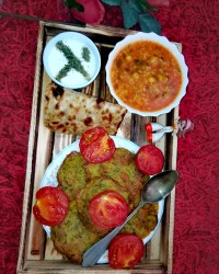 کوکو سیب زمینی و شوید و آش گوجه فرنگی ?