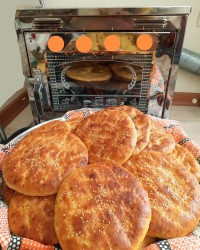 نان فطیر در تنور گازی