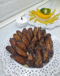 کتف و بال رب اناری با کنجد در فر