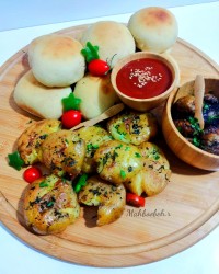 سیب زمینی تنوری و نان شکم پر