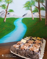 کیک پرتقالی با رویه شکلات و نارگیل