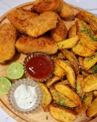 مرغ سوخاری و سیب زمینی تنوری