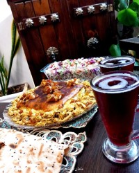 کشمش پلو با مرغ ریش شده