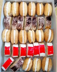 شیرینی لطیفه و رولت 