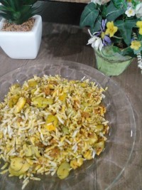 باقالی پلو با گوشت چرخ کرده.