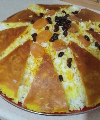 تهدیگ آردی همرا برنج زردچوبه ایی 