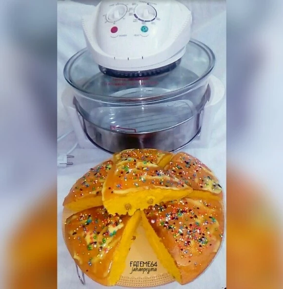 عکس پخت کیک در هواپز برقی (کیک پوست پرتقال وکشمش )